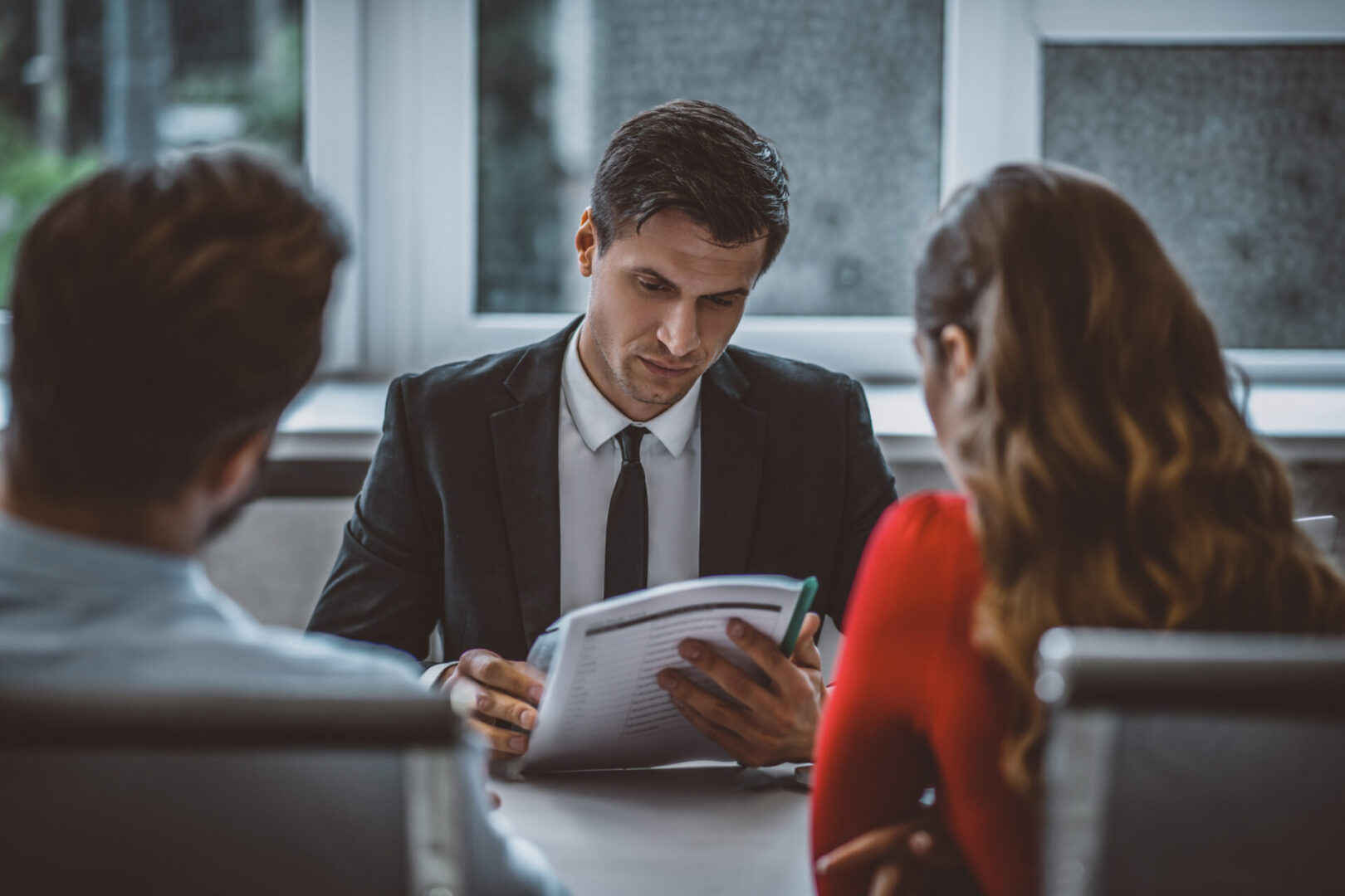 Business meeting with three people